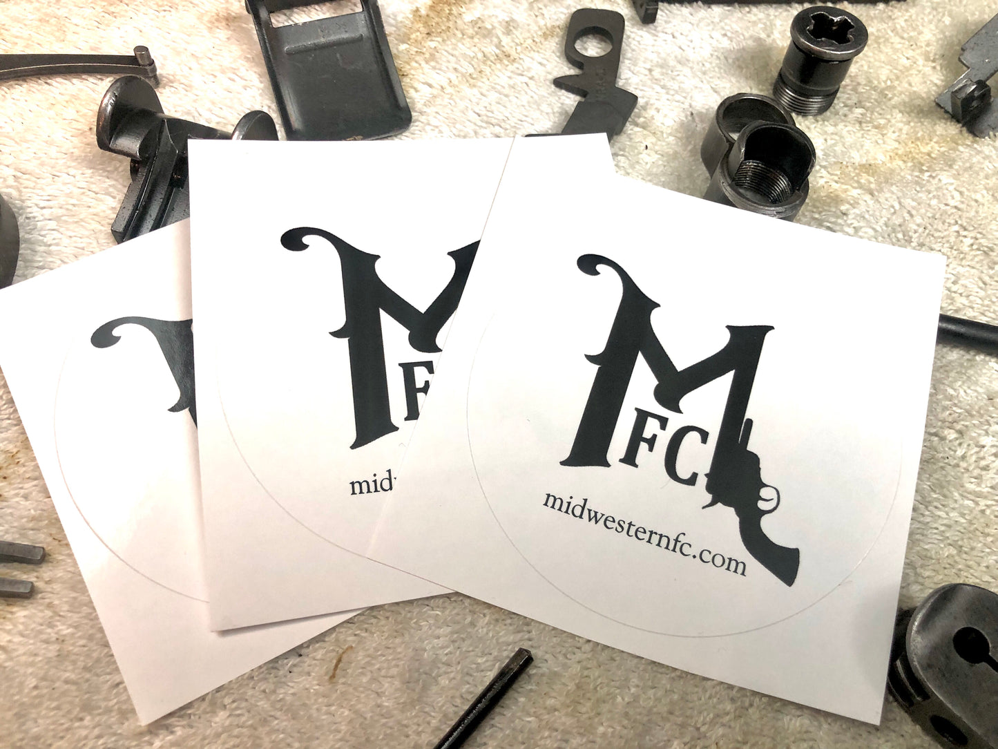MFC logo sticker. Round & glossy.