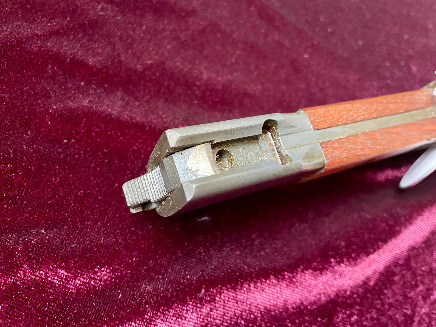 Belgium FN Type A bayonet with wood grips and flash hider prongs.
