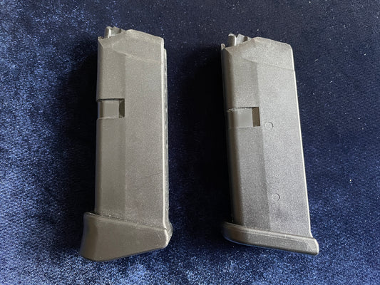(2) Glock 42 factory mags: 1 finger rest base plate, 1 standard.