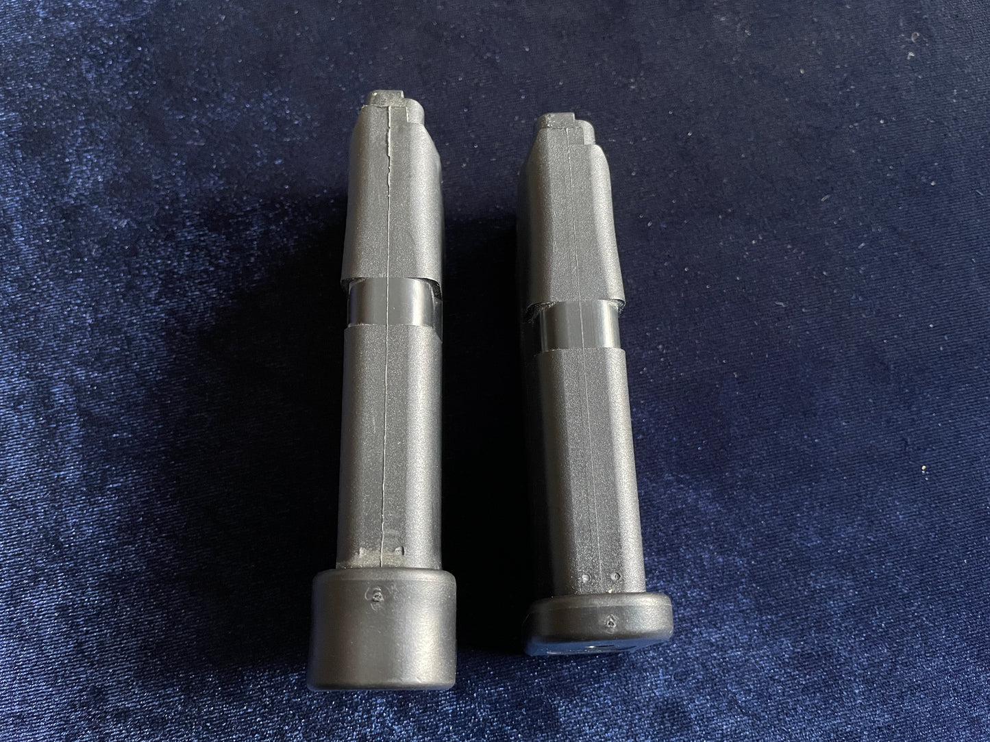 (2) Glock 42 factory mags: 1 finger rest base plate, 1 standard.