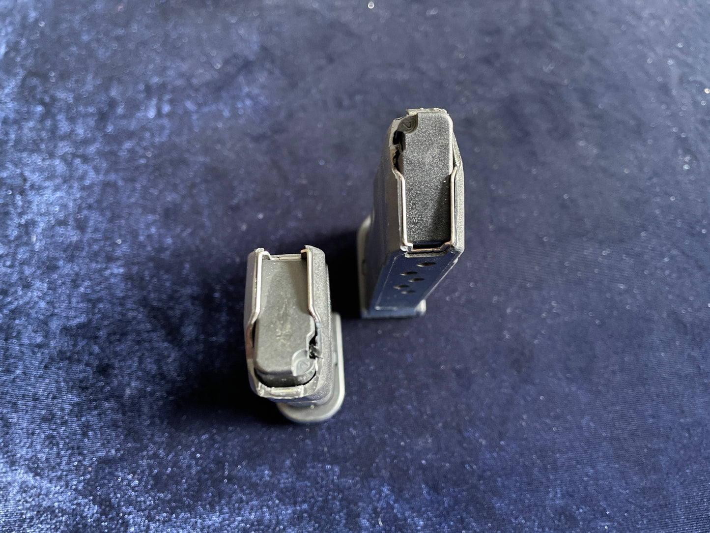 (2) Glock 42 factory mags: 1 finger rest base plate, 1 standard.