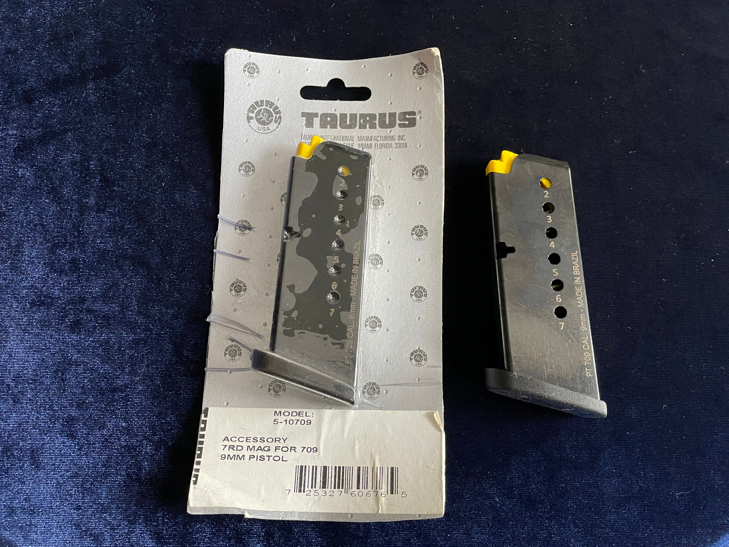 (2)Taurus PT 709 7 rd 9mm mag. First gen OEM factory mags