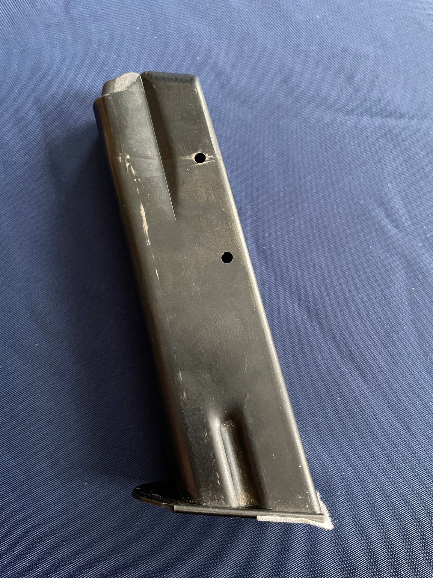 CZ 75 blued steel magazine.