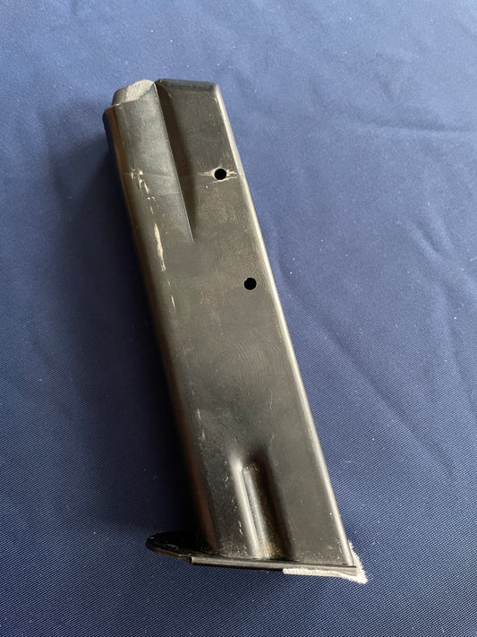 CZ 75 blued steel magazine.