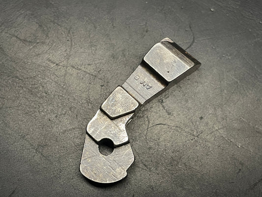 M1 carbine hammer, type III, IBM. Marked " AM B "