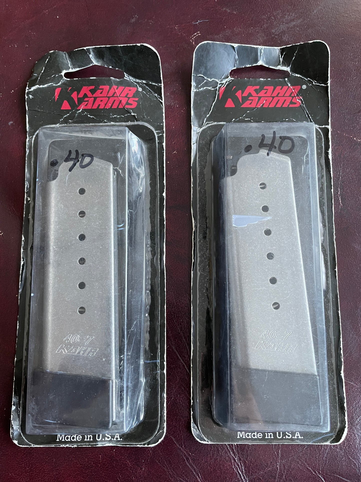 (2) Kahr Arms KT40, 7rd extended base factor magazines in .40 S&W NOS